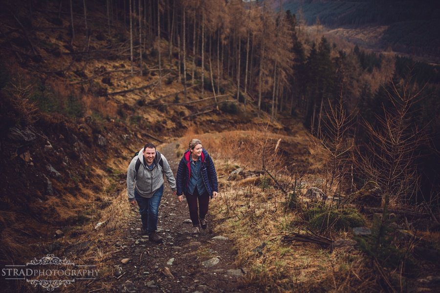 pre wedding engagement photography in scottish highlands, engagement, scotland, mountains, hiking, couple, engaged, save the date, adventure, scottish views