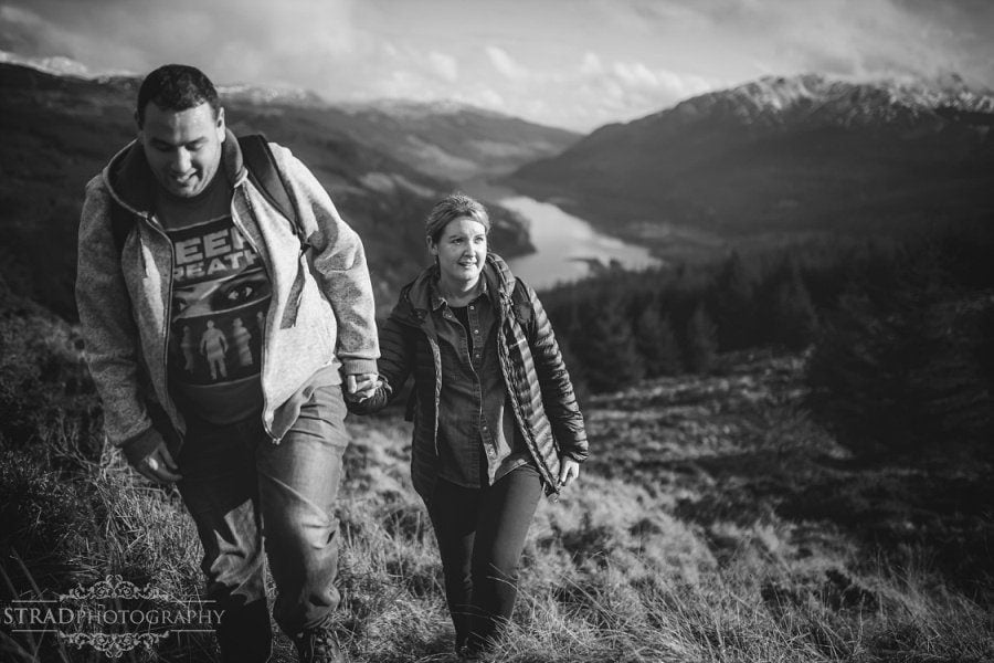 pre wedding engagement photography in scottish highlands, engagement, scotland, mountains, hiking, couple, engaged, save the date, adventure, scottish views