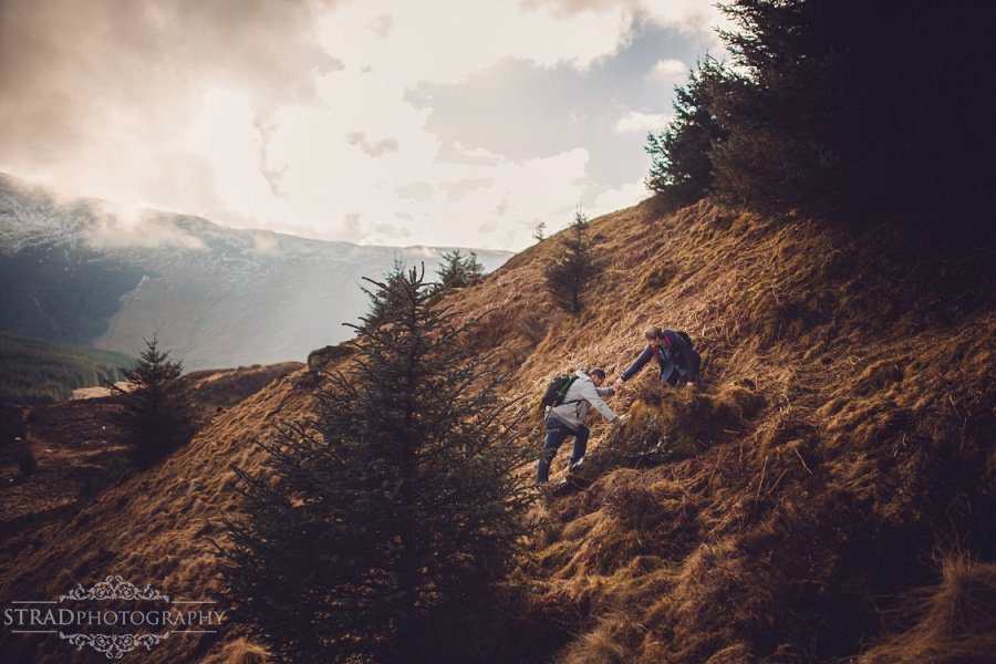 pre wedding engagement photography in scottish highlands, engagement, scotland, mountains, hiking, couple, engaged, save the date, adventure, scottish views