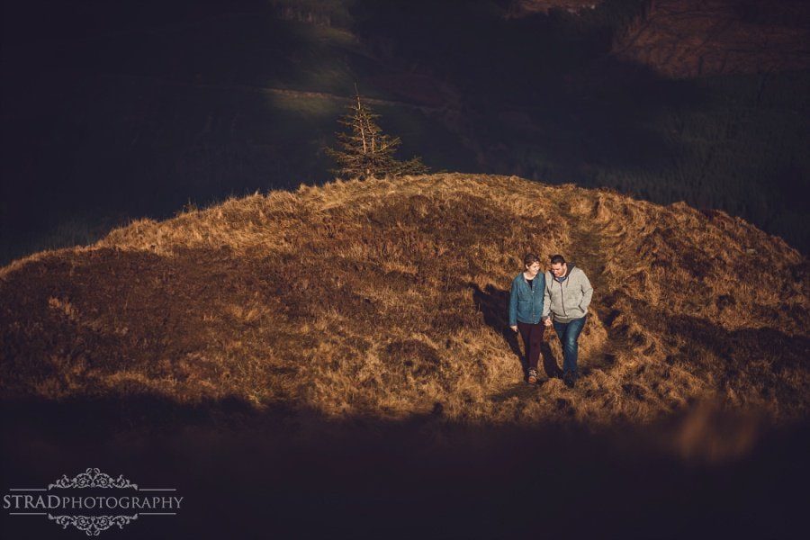 pre wedding engagement photography in scottish highlands, engagement, scotland, mountains, hiking, couple, engaged, save the date, adventure, scottish views