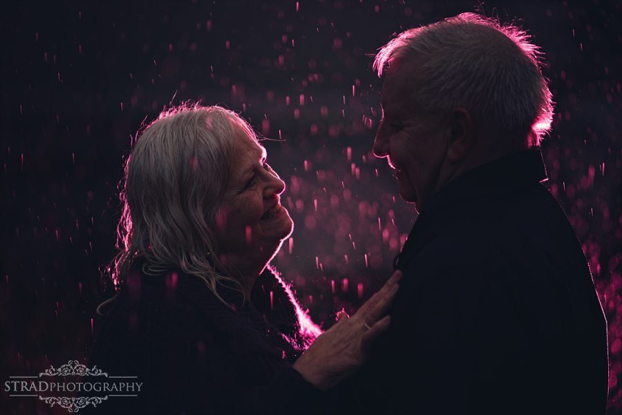 beautiful scenery, deers, elderly couple, engagement photography, glasgow photographer, glen etive, Glencoe, grandma, grandpa, hiking, kilt, landscapes, man and woman, marr, marriage, old couple, old married couple, older couple photo shoot in Glencoe Scotland, outlander, poncho, posing ideas, scotland, scottish couple, scottish highlands, senior couple, tartan