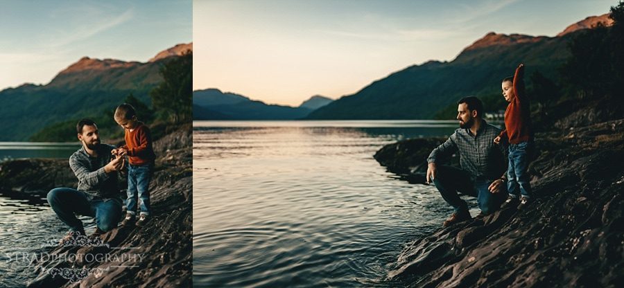 father and son are throwing rocks to the loch lomond