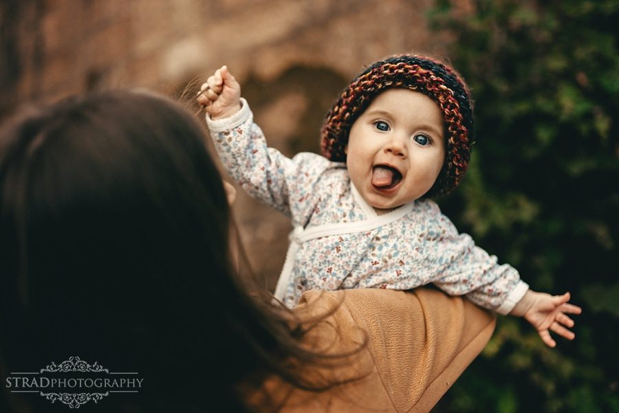 little girl showing her tongue