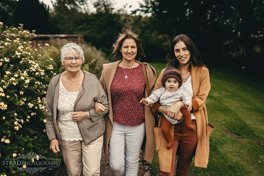 Portrait of 4 generation of women walking