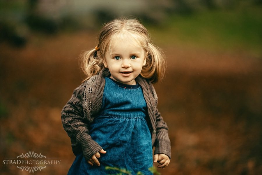 Portrait of a little girl in autumn in Balloch Country Park