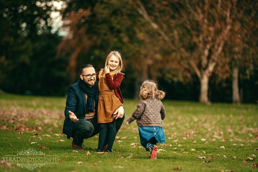 Little girl runs toward her dad