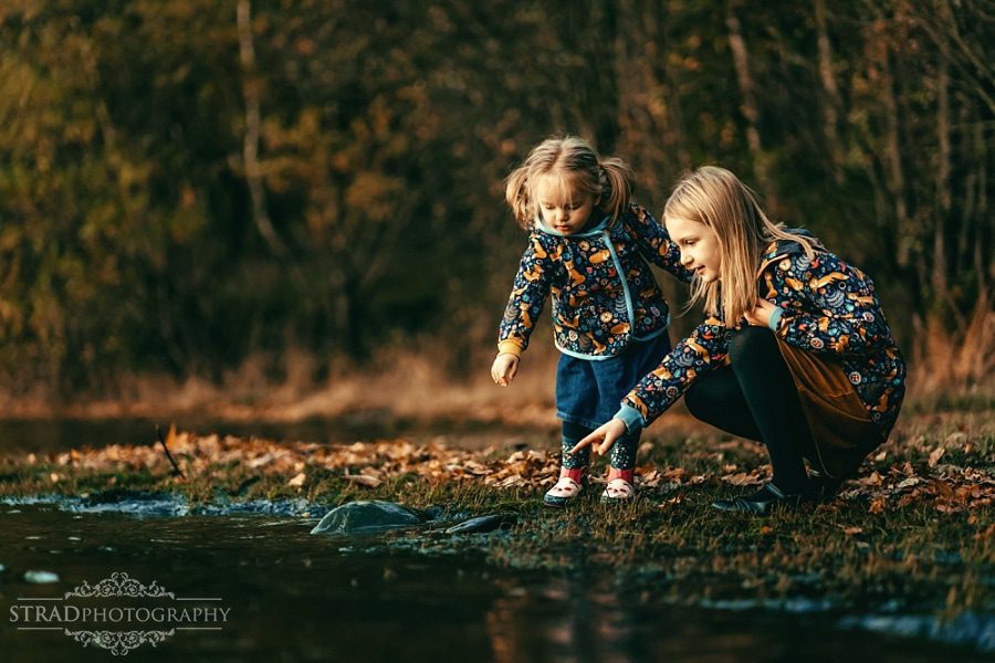 Sister playing in water