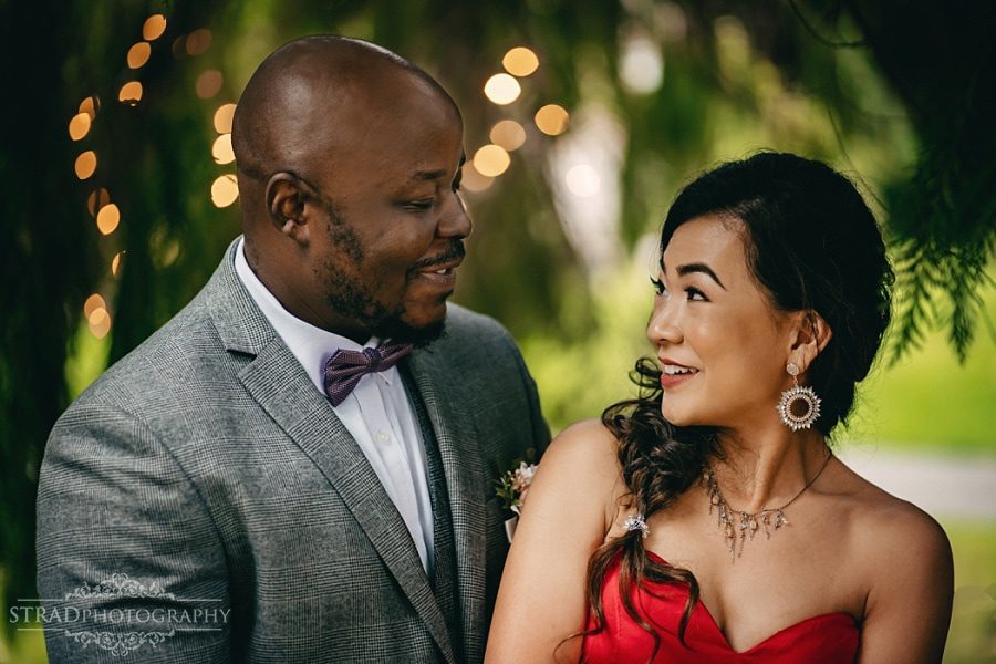 Close up photo of the couple under the tree
