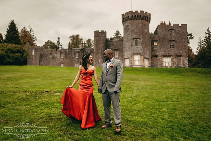 Bride and groom walking in front of Balloch Castle