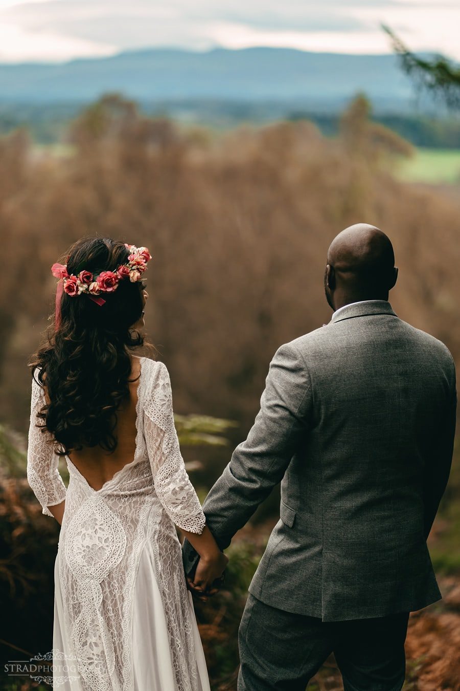 Bride and groom's hands together