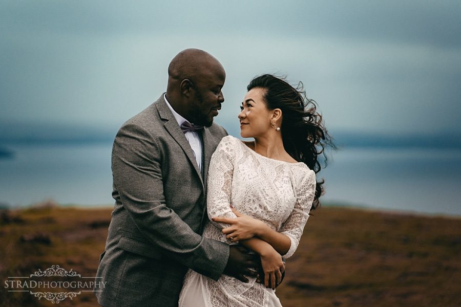 Beautiful photo of the bride and groom on the top of Conic Hill