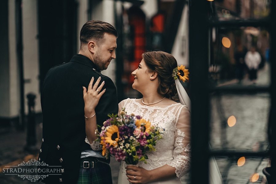Bride and groom close portrait on Ashton Lane