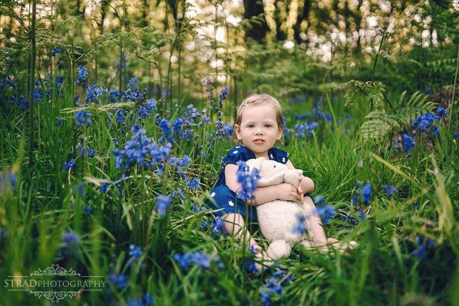 Portrait of a little girl in the bluebells