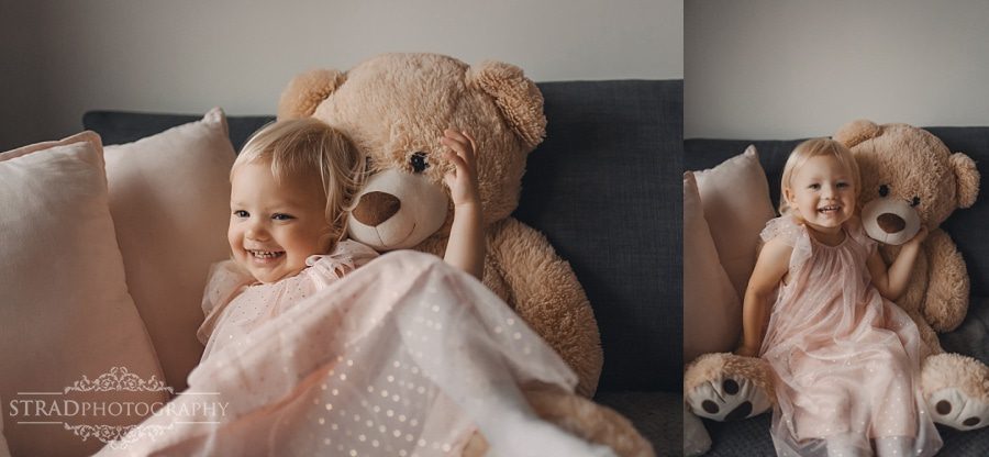 portrait of a little girl with her teddy bear