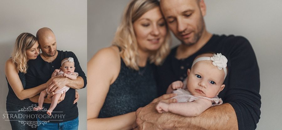 Parents holding their newborn daughter