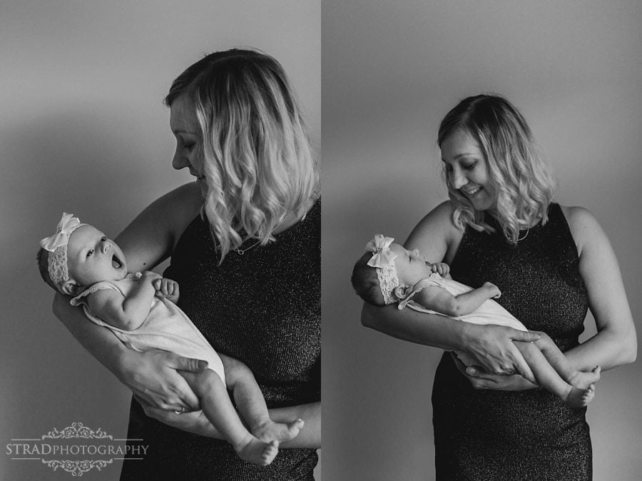 Mother holding her newborn daughter