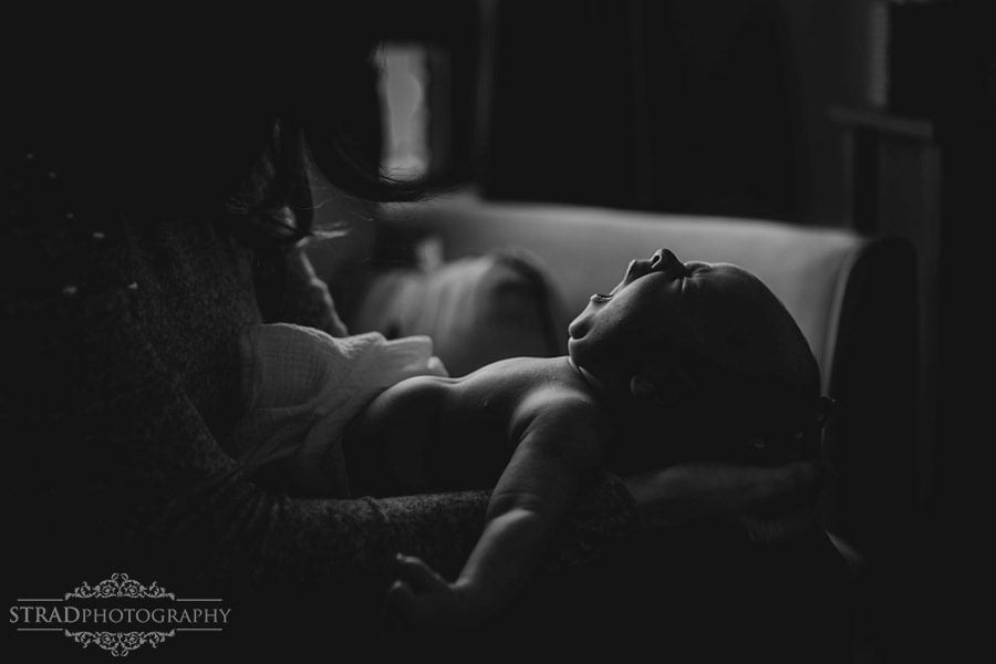 newborn baby boy yawns