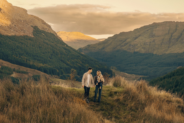 A family walking down in the Scottish highlands