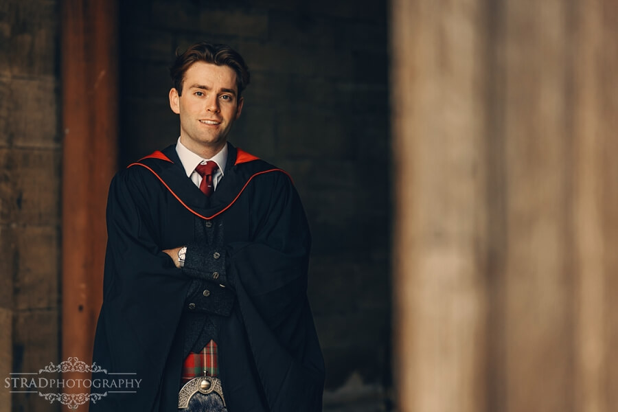 Graduate in traditional academic attire.