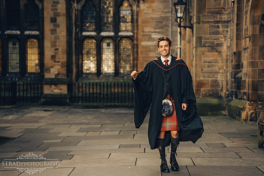 Graduate in traditional Scottish attire.