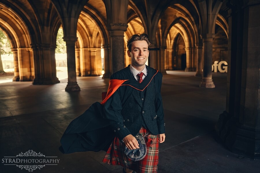 Graduate in traditional Scottish attire.