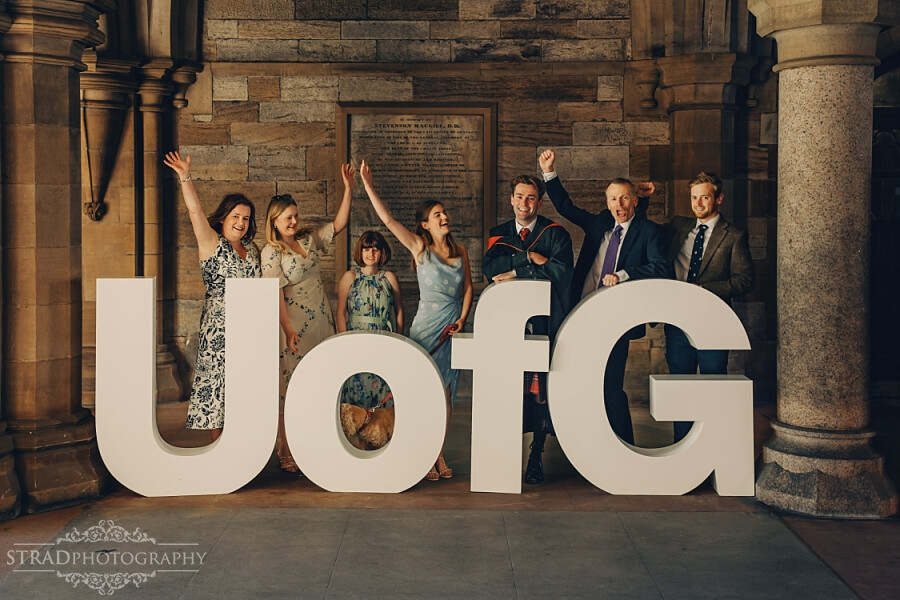 Celebration with large UofG letters.
