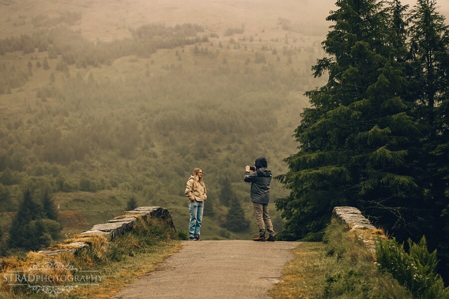 man proposing to his girlfriend on Butter Bridge, Scotland
