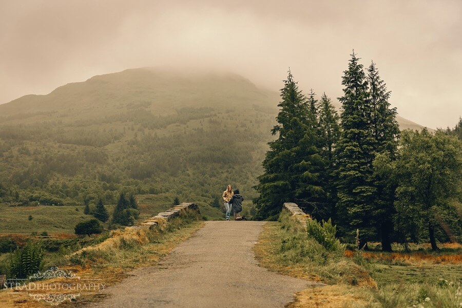man proposing to his girlfriend on Butter Bridge, Scotland
