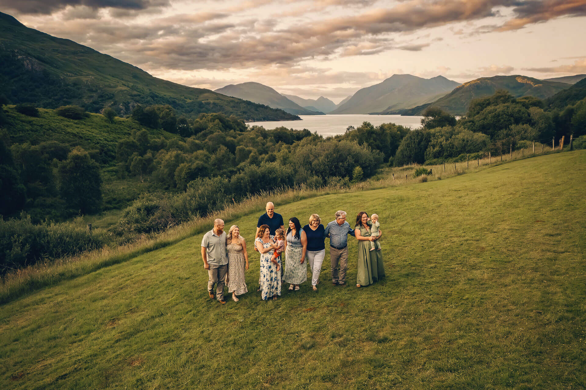 Vacation Family Photographer in Scotland photographing a family from a drone at Loch Etive