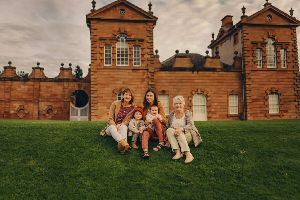 Multigeneration family portrait in front of Chatelherault Country Park.