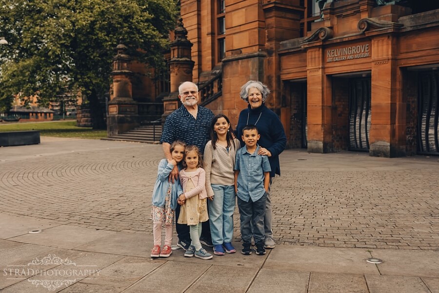 Grandparents and grandchildren portrait outside Kelvingrove.