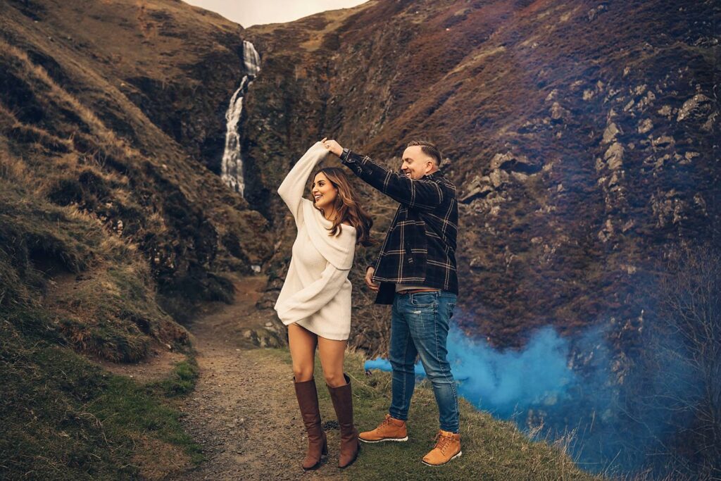 Blue smoke bomb photos near Grey Mare’s Tail waterfall