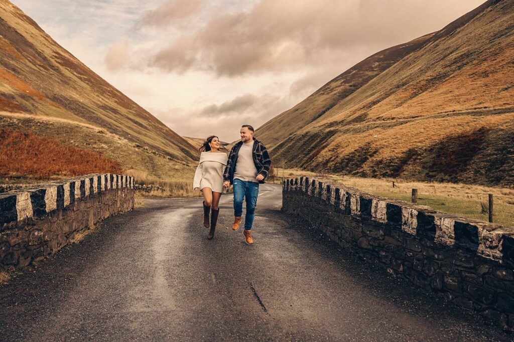 Couple joyfully walking in nature.