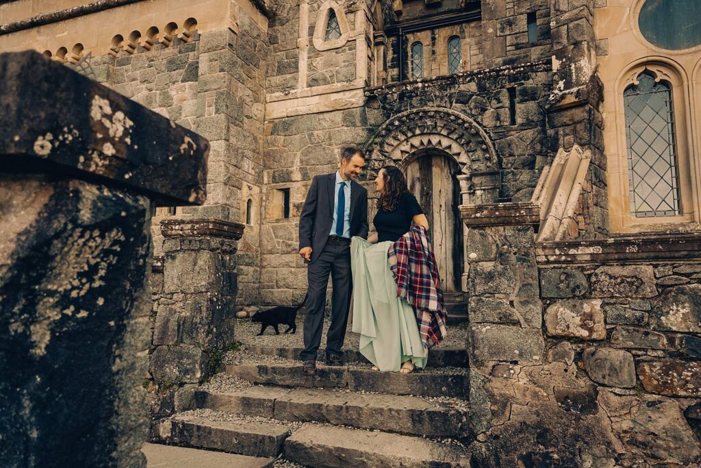 Couple ascending stone steps together.