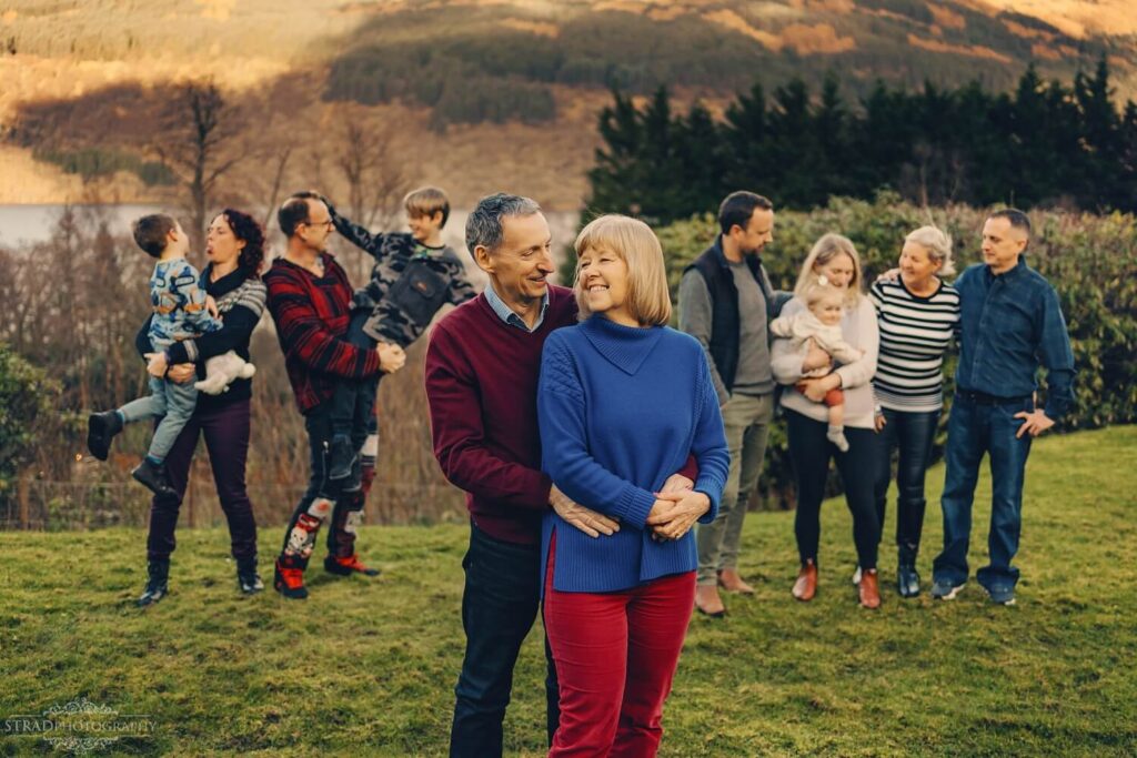 Family gathering in scenic outdoor setting.