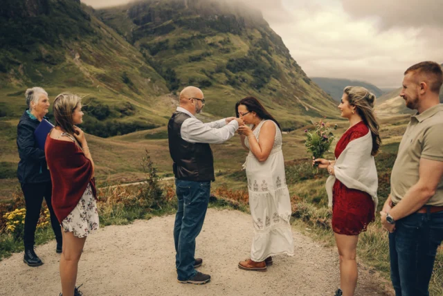 Marie and Stefan celebrated their 25th wedding anniversary in the most special way with a beautiful vow renewal in Glencoe. The ceremony took place at the Three Sisters and was led by the wonderful @alyson.the.humanist . It was filled with so many unforgettable moments. They tied the knot again, shared a drink from the quaiche, and to everyone’s surprise a piper named William started playing during the ceremony. Of course we had to take some photos with him afterwards. Their four children and their partners were there to witness it all and we had such a fun time capturing the laughs, emotions and love that filled the morning. Truly a day to remember.....#glencoe #glencoescotland #glencoewedding #glencoelovers #glencoecouples #vowsrenewal #scotlandvowsrenewal #scotlandweddingphotographer #elopementphotographerscotland #scotlandelopementphotographer #glencoeelopement #scotlandphotographer #scotlandlove #scottishhighlands #scotlandisnow #destinationwedding #intimatewedding #adventurewedding #scottishwedding #scotlandphotography #glencoephotographer